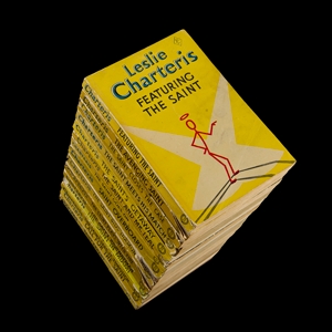 Stack of books: cover The Saint Plays with Fire by Leslie Charteris Hodder & Stoughton Yellow Jacket, 1950s